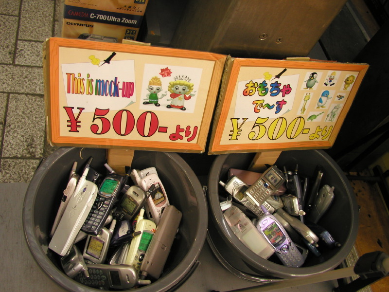 Buckets of mock-up cell phones, Akihabara
