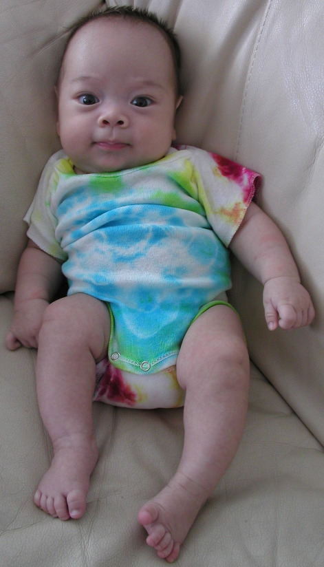 p9116288 Kyle in tiedye on couch
